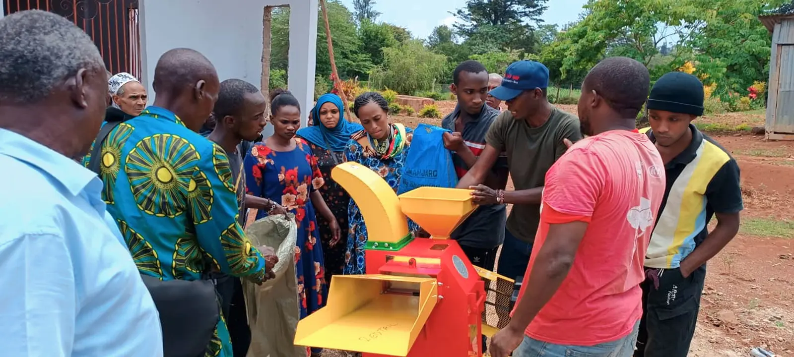 Practical chaff-cutter demonstration with farmers